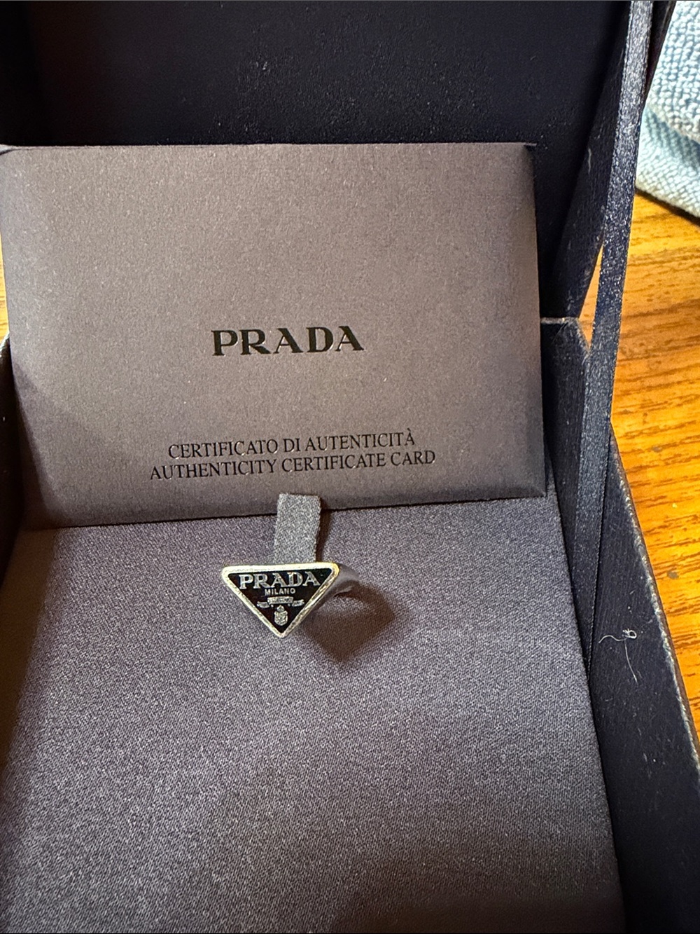 Prada Small Triangle Logo Pin in Black and Gold-Tone very cozy nice and luxury